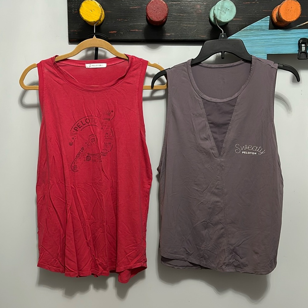Peloton large workout tanks. Red screen print graphic. Glyder x Peloton purple